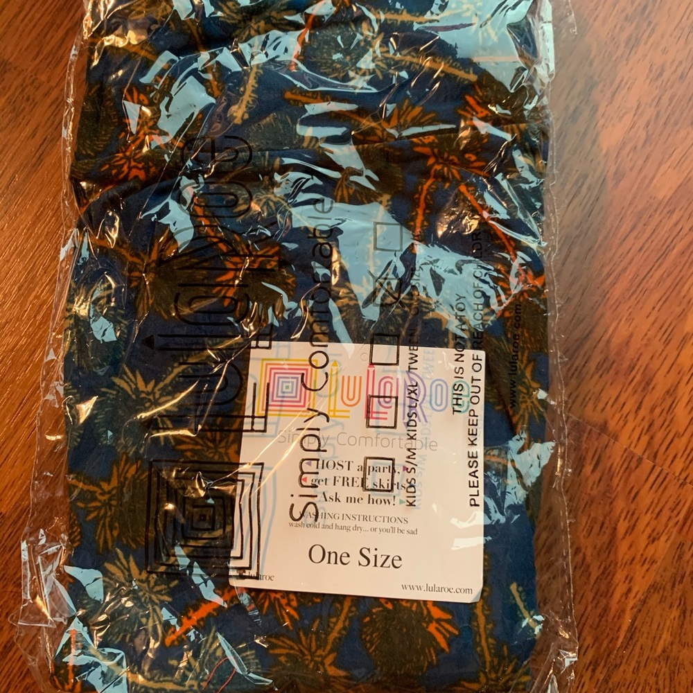 NWT LulaRoe OS navy with palm tree leggings